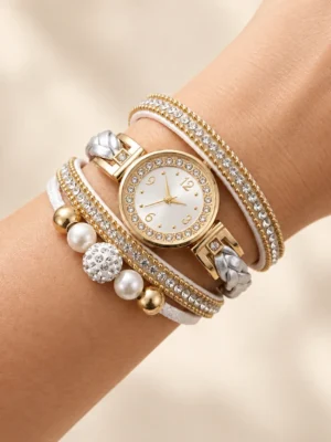 Reloj dorado con cristales y pulsera blanca de perlas
