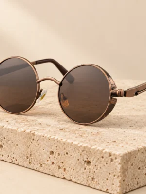 Lentes steampunk redondos color bronce con cristales oscuros y detalles laterales